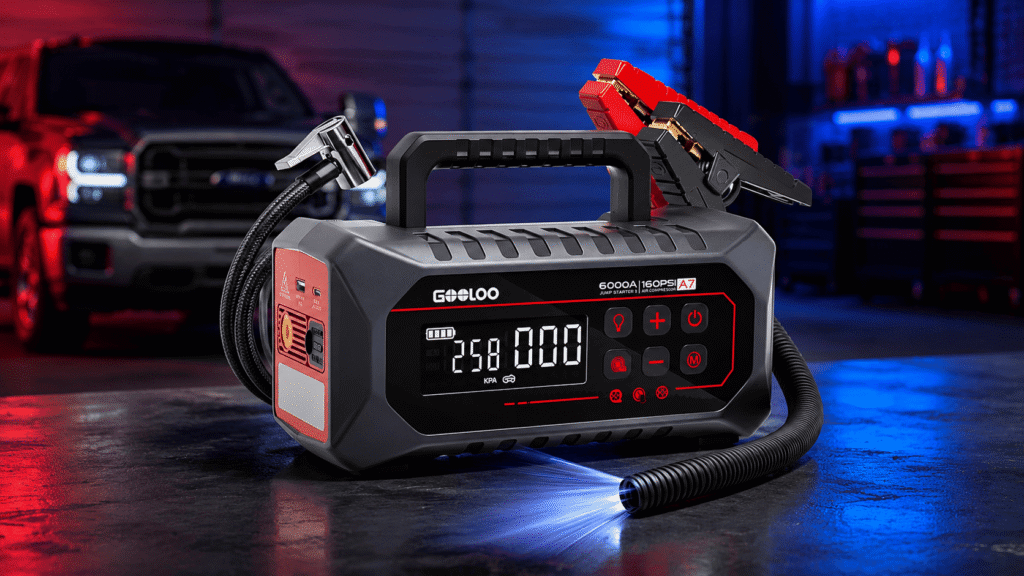 GOOLOO A7 jump starter with air compressor and clamps in a garage setting
