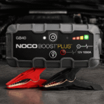 NOCO Boost Plus GB40 lithium jump starter review showing portable jump starter with clamps for a car battery